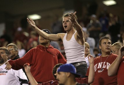 A Rebels fan gets upset about a call by the referees Thursday night at Sam Boyd Stadium. 