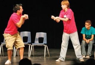 Centennial's Joshua Woofter, left, and Arbor View's Michael Swift practice their acting during the sixth annual Improv Festival on Oct. 16, at Centennial High School.
