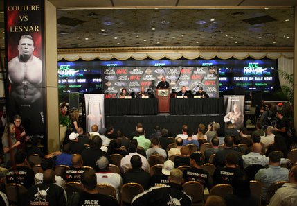 UFC President Dana White, center, hosts a news conference in the lobby of the MGM Grand Thursday, November 13, 2008. Heavyweight champion Randy 