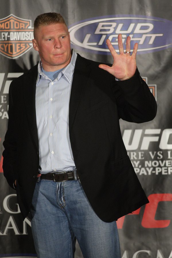 UFC heavyweight fighter Brock Lesnar waves to fans during a ...