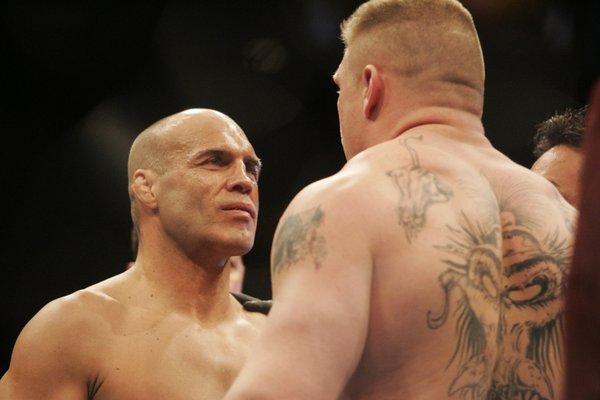 Randy Couture, left, and Brock Lesnar face off before their ...