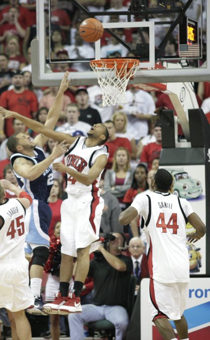 UNLV's Rene Rougeau contests San Diego State's Rob Jones.