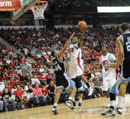 Wink Adams lays it in for two in the first half of Saturday's season opener.