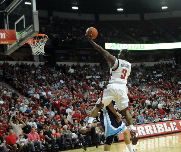 Mareceo Rutledge finish the fast break with a soaring lay ...