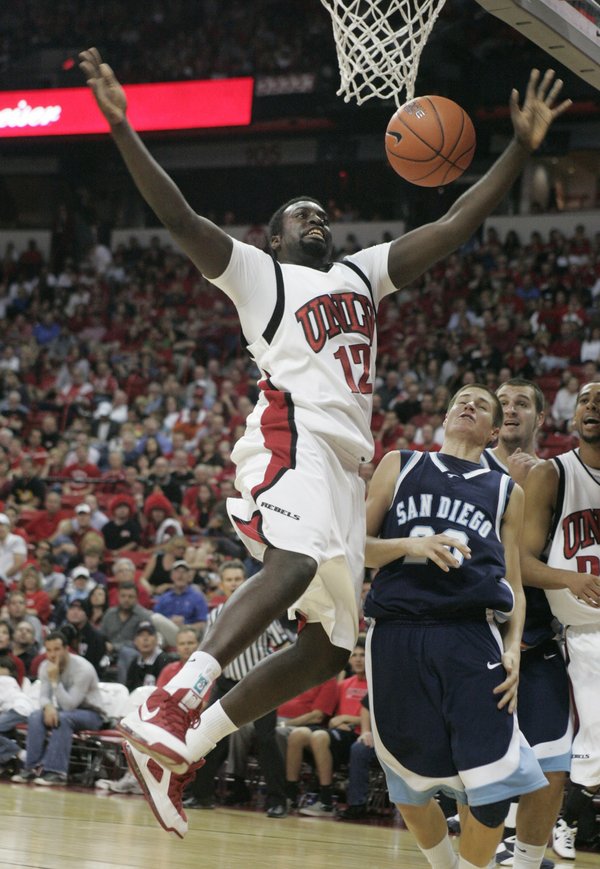 UNLV forward Brice Massamba loses the ball after being fouled ...