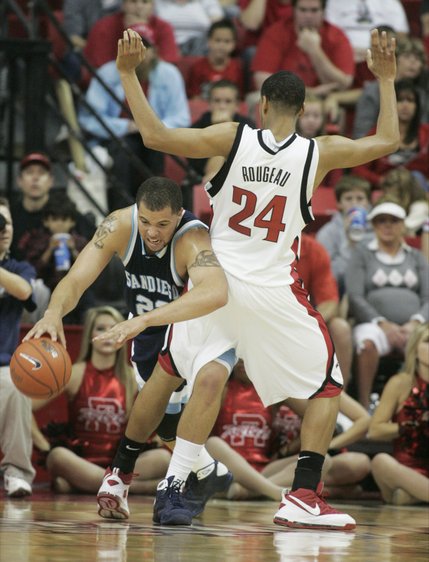 UNLV guard Rene Rougeau pressures San Diego forward Rob Jones during the first half of their game Saturday, Nov. 15, 2008. 