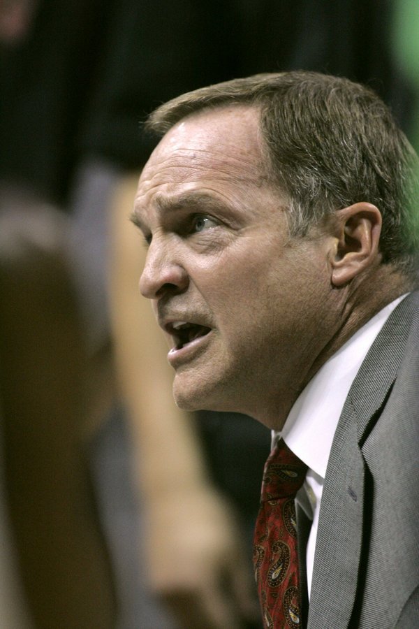 UNLV head coach Lon Kruger talks to his team during ...