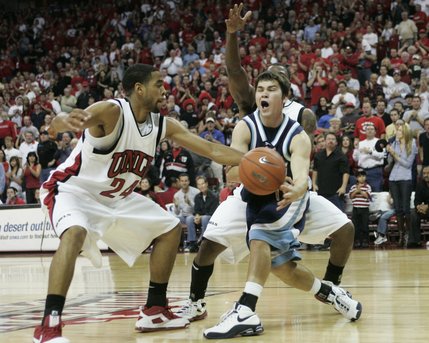 NLV guards Rene Rougeau, left, and Wink Adams pressure San Diego guard Devin Ginty on an inbounds pass Saturday, November 15, 2008 at the Thomas & Mack Center. UNLV won 65-60. 