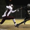 Palo Verde running back Sidney Hodge dodges Cimarron-Memorial defensive back Roderick Washington during the Sunset Regional semifinals at Palo Verde High School on Nov. 14. Hodge verbally committed to UNLV on Jan. 26.
