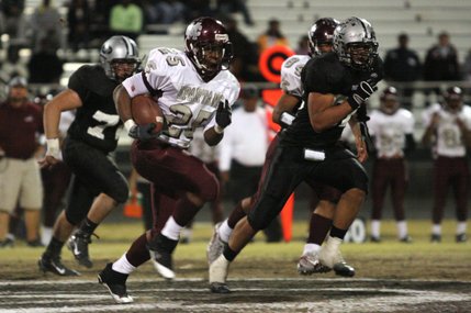 Cimarron-Memorial running back Stephen Nixon sprints down field against Palo Verde during the Sunset Regional semifinals at Palo Verde High School on Friday.
