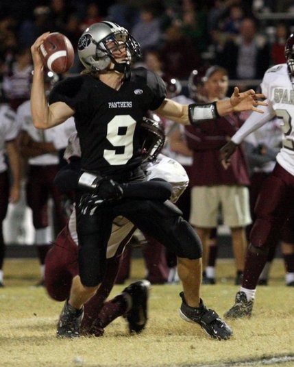 Cimarron-Memorial linebacker Maurice Davis takes down Palo Verde quarterback Kelly Zurowski during the Sunset Regional semifinals at Palo Verde High School on Friday.
