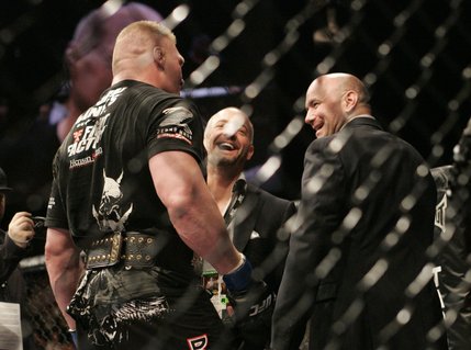 UFC CEO Lorenzo Fertitta, center, and President Dana White joke with Brock Lesnar that they will have to get him a larger belt after he beat Randy Couture for the heavyweight title Saturday, November 15, 2008 at the MGM Grand Garden Arena. Lesnar won by TKO in the second round.