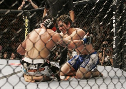 Kenny Florian embraces Joe Stevenson out of respect after he submitted Stevenson in the first round of their lightweight bout at UFC 91 Saturday, November 15, 2008 at the MGM Grand Garden Arena.