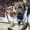 UNLV's Joe Darger looks to get out of a double team during the second half of the Rebels' game Satur