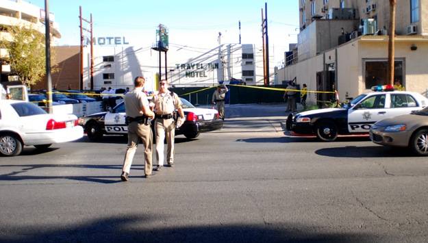 Police restrict traffic today as they investigate a shooting at the Gold Spike Hotel and Casino in downtown Las Vegas.