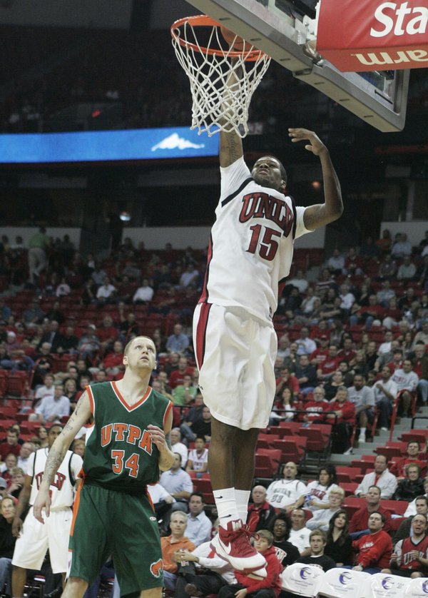 UNLV forward DeShawn Mitchell flies in for a dunk in ...