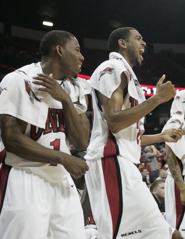 UNLV's Wink Adams, left, and Rene Rougeau cheer on their ...