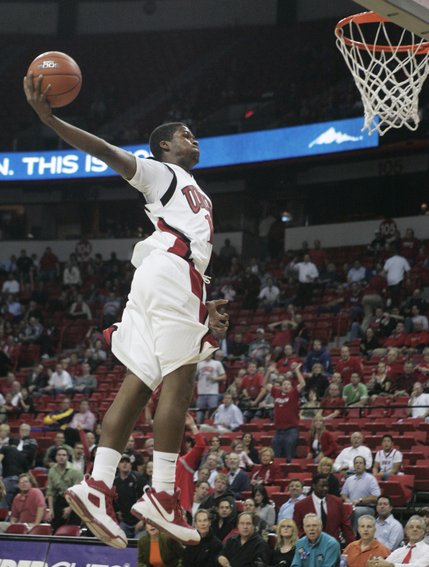 UNLV forward DeShawn Mitchell flies in for a dunk in the final minutes of the game against Texas-Pan American in November at the Thomas & Mack Center. 