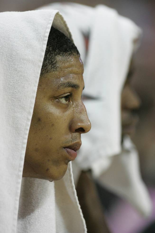 UNLV guard Tre'Von Willis takes a breather with a towel on his head during the second half of the game against Texas-Pan American Tuesday. Willis finished with six points, two rebounds and a steal in UNLV's 73-48 win.