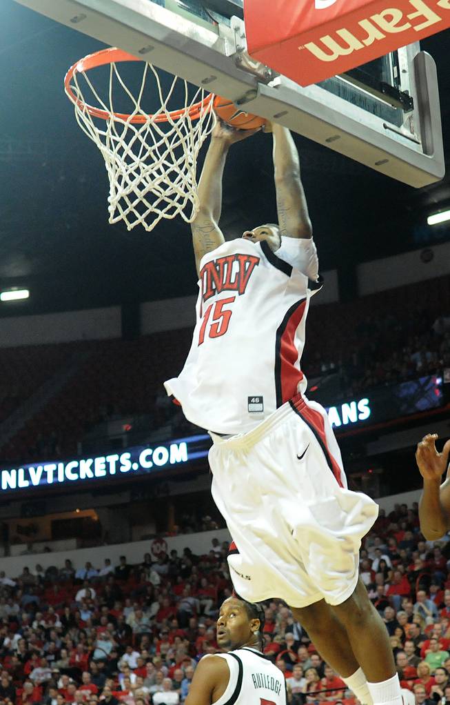 DeShawn Mitchell puts down the alley-oop for one of his three dunks.