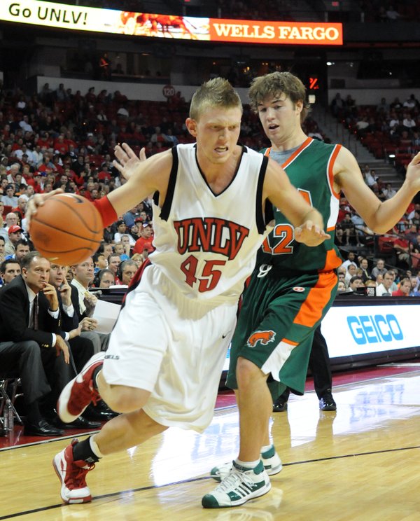 Joe Darger goes to the baseline against Texas-Pan American's Nick ...