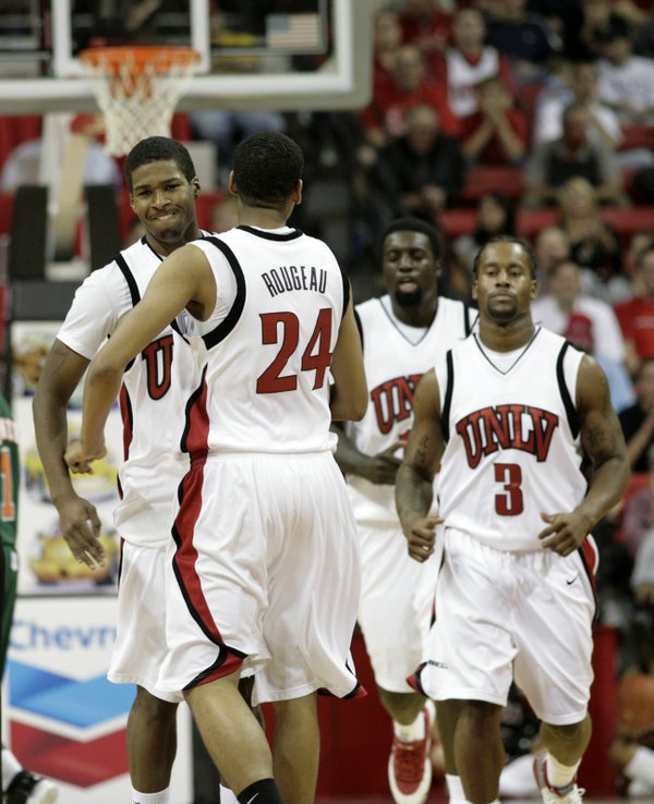 Rene Rougeau and DeShawn Mitchell celebrate at the end of ...