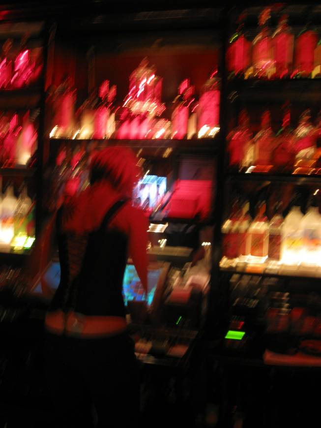 A bartender serves up a drink in Drai's, a popular after-hours night spot on the Las Vegas Strip.