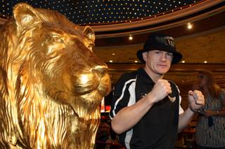 Junior welterweight boxer Ricky Hatton of Britain poses during his official 