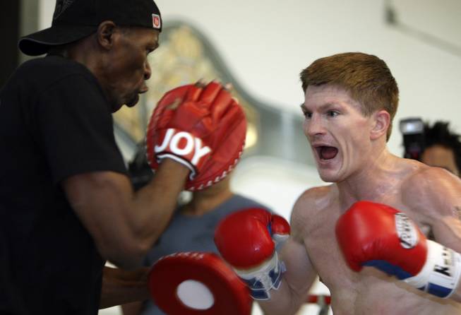 Junior welterweight boxer Ricky Hatton, right, of Britain works on his timing with trainer Floyd Mayweather Sr. at the IBA gym in Las Vegas, Nevada on Tuesday, November 18, 2008.