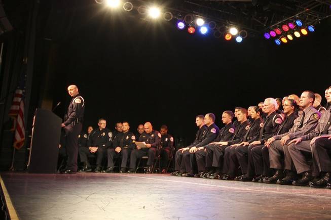 Henderson Police Department officer and class speaker Shawn Thibeault, left, addresses guests and officers in his Class of 2008-02 during the Southern Desert Regional Police Academy commencement ceremony Nov. 13.