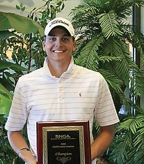 John Vornsand displays his award for winning the Clark County Amateur golf tournament.