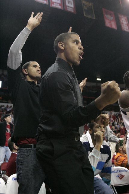 UNLV's Chace Stanback, left, and Steve Jones cheer their team as it pulls away from Northern Arizona during the second half on Nov. 20 at the Thomas & Mack Center. 