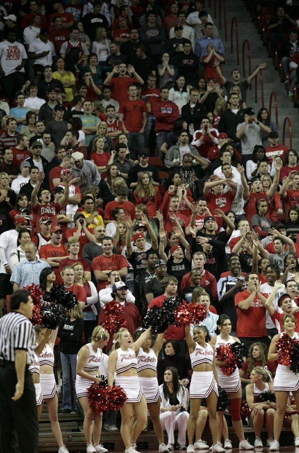 Rebels cheerleaders and fans are fired up for the game ...