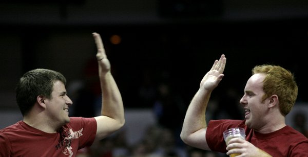 Two Rebels fans give each other a high-five after UNLV ...