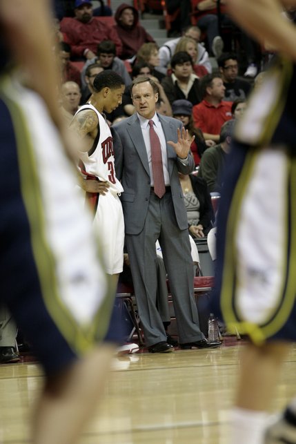 Head coach Lon Kruger talks with Tre'Von Willis late in the second half of Wednesday's game against Northern Arizona.