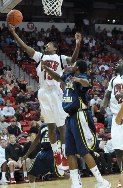 DeShawn Mitchell pulls down a rebound Wednesday night against Northern Arizona.