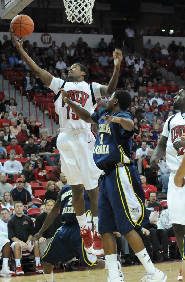 DeShawn Mitchell pulls down a rebound Wednesday night against Northern ...