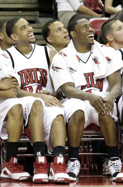 With the Rebels' big lead, Rene Rougeau and Wink Adams enjoy their time on the bench. 