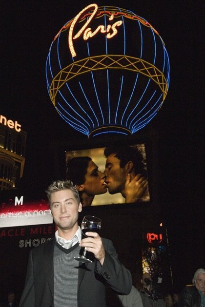 Lance Bass poses in front of the Paris resort. 