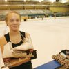 Figure skater Jessica Rearich, 14, poses with skates at the Sobe Ice Arena at the Fiesta Rancho.