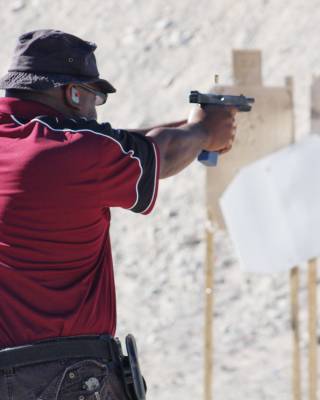 Jeffrey Yerger shoots the targets at one of the courses during the Sin City Shooters contest at Desert Sportsman's Rifle and Pistol Club.