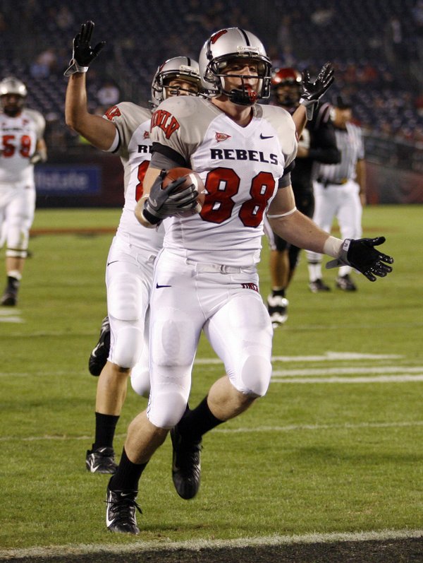 UNLV wide receiver Ryan Wolfe scores a touchdown on a ...