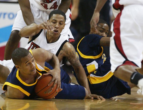 UNLV guard Tre'Von Willis and North Carolina A&T forward Kam ...