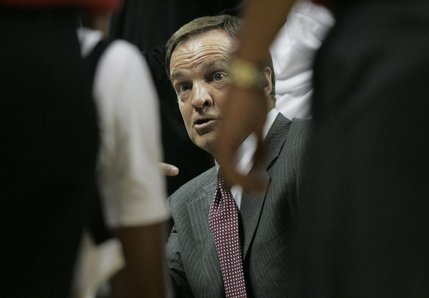 UNLV coach Lon Kruger talks to his team during a time out in its game against North Carolina A&T Saturday at the Thomas & Mack Center. UNLV won 71-58 and improved to 4-0. 
