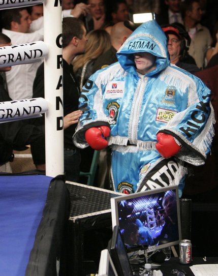 Ricky Hatton of Britain enters the ring wearing a fat suit as a joke before fighting Paulie Malignaggi of the U.S. in a junior welterweight bout at the MGM Grand Garden Arena in Las Vegas.