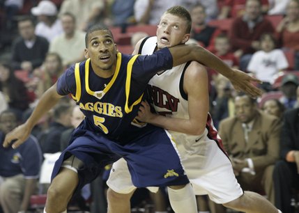 UNLV's Joe Darger and Julian McClurkin of North Carolina A&T fight for position in the first half of Saturday's game.