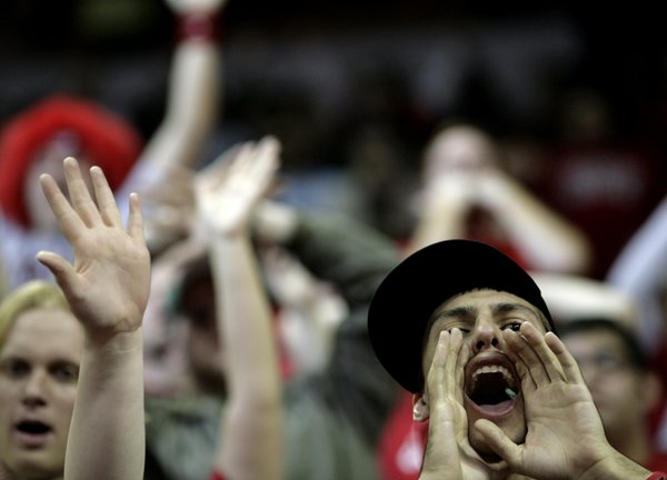 UNLV fans get excited after the Rebels hit a three.