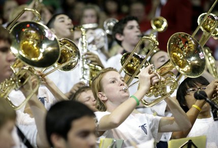 The band of Foothill High School fills in for the Rebels band, which was with the football team in San Diego.