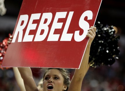 The Rebel cheerleaders get the crowd going during a timeout Saturday night.