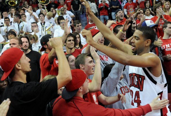 Rene Rougeau high fives the fans after the win Saturday ...